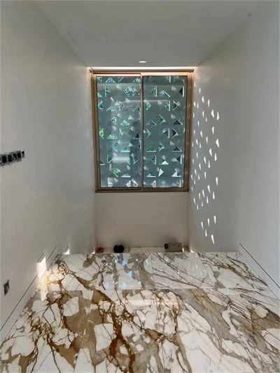 Calacatta gullmarmorflis 18x18